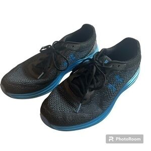 Under Armour Liquify black and blue athletic shoes